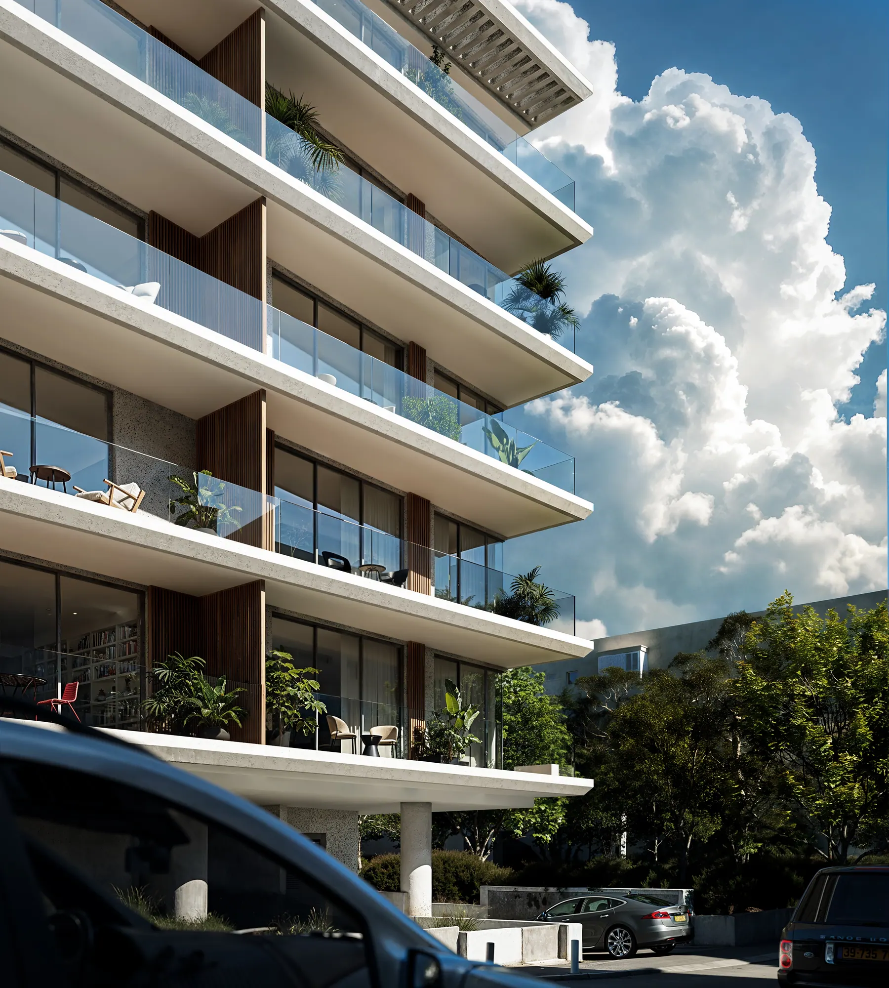 Cantilevered balconies against a cumulus cloud